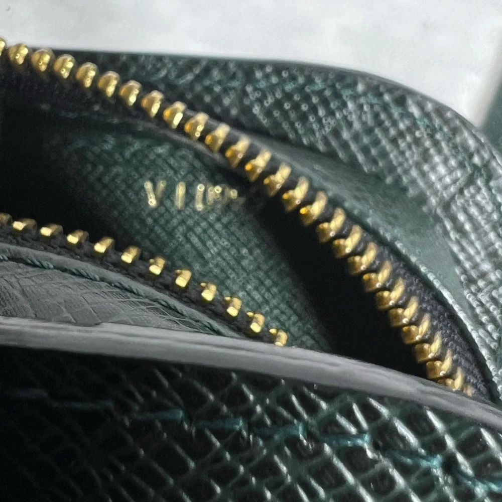 7006: Louis Vuitton Taiga Leather Wristlet & Checkbook Cover Set Green